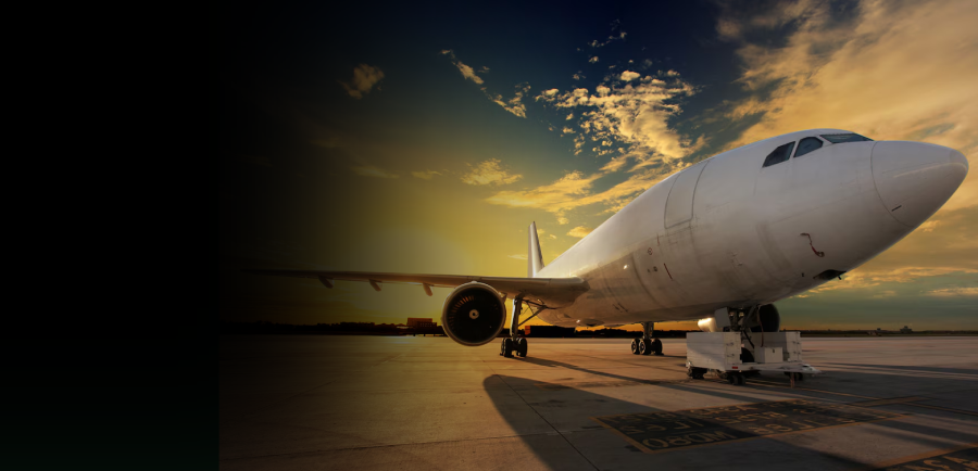 Airplane at sunset on runway