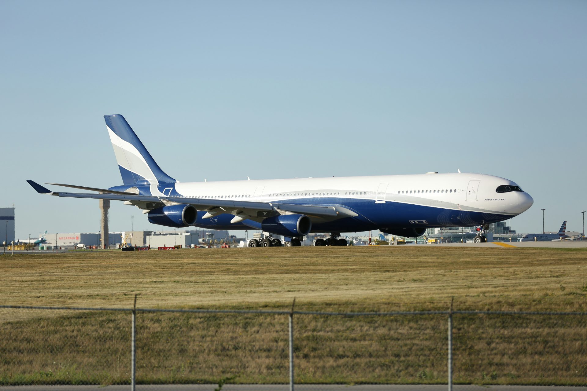 Airplane on grassy runway